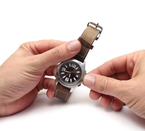 Person Winding Watch